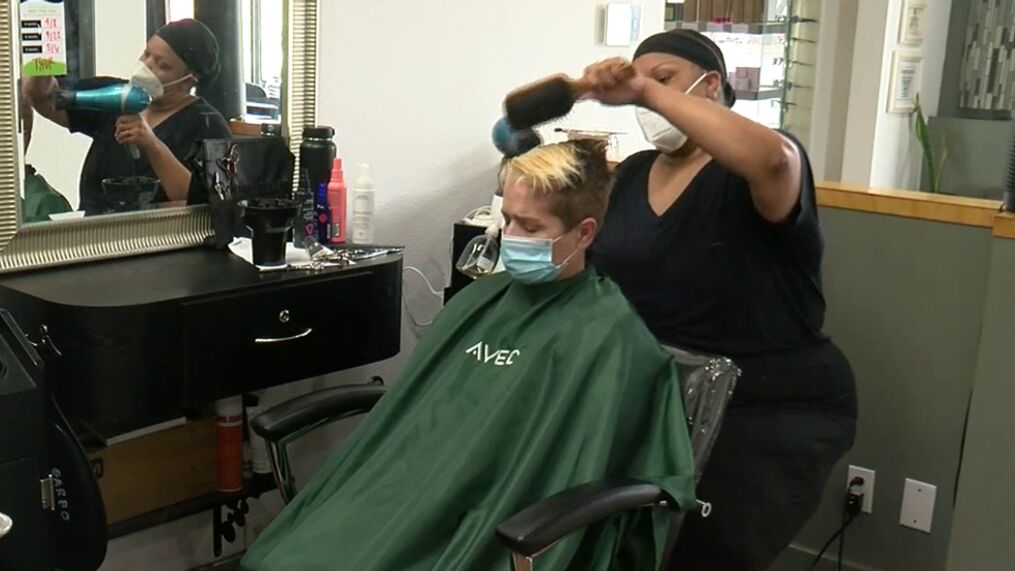 Local Austin salon opts to require masks in absence of state rule